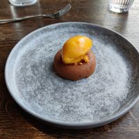 The super dessert made with cloudberry and chocolate. DELICIOUS at Sky Kitchen & View  in Rovaniemi