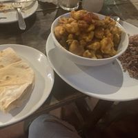 Super tasty cauliflower Manchurian with rice and a plain chapati. So so so good!  at Tasty Cafe in Tiruvannamalai