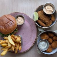 Vegan burger with chili mayo, avocado fried with chili mayo, and fried cauliflower with garlic aioli at Kaffi Krokur in Saudjarkrokur