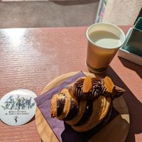 Chocolate and apricot croissant, match latte, sticker at Julietta Pastry and Lab in Rome