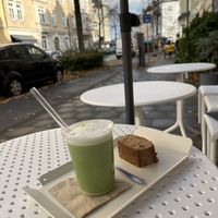 Hot matcha and banana bread  at Neosociety Munich in Munich