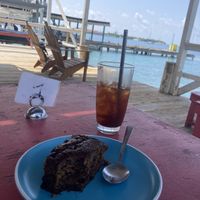 Banana bread and iced americano  at Pink Flamingo in Utila