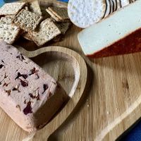 Vtopian sun dried tomato Brie and pumpkin seed Muenster   at Vtopian Cheese Shop in Portland