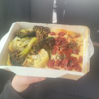 Hummus with roast veg. Very tasty. I don't usually like broccoli, but this was excellent! The semi-dried tomatoes made the whole thing so good. at Olivka in Almaty