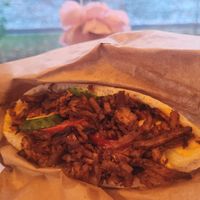 The BBQ tofu pita pocket. I was obsessed with these. Ate 2 in one sitting 😂 The tofu tastes bacon-y in the best way possible. Delicious sauce inside, too. at Olivka in Almaty