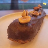 Eclair. Unfortunately, the coconut oil it was made with was slightly off, so that's all I could taste. at Olivka in Almaty