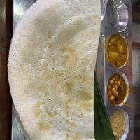 Plain Dasa with chickpea curry, coconut chutney, pumpkin curry  at Vishnu Vihar Vegetarian Hotel in Kandy