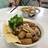 Bak Kut Teh noodles with an unimaginable amount of mushroom varieties and mock meats! Some VERY meaty textures too. (Laksa in the background! Very, very tasty he said)  at Ambience Tea House & Veggie Cafe - 茗楼茶艺素食馆 in Ipoh