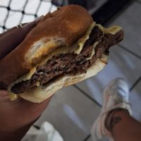 Double patty impossible burguer with vegan cheese and avo at Burger Urge  in Earlville