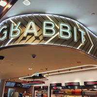 Look for the sign. It's on a corner next to escalators at DXB - Grabbit - T3 in Dubai