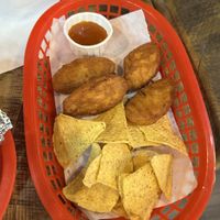 Vegan nachos and buffalo wings with a dip.  at Viva El Burrito in Leicester