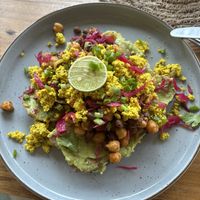 Scrambled tofu with beans on avo on toast  at Layback Rooftop in Weligama