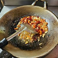 Making chili jam at May Kaidee x Morning Glory Home Cookery School in Chiang Mai
