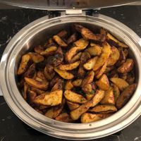 Cajun roast potatoes   at AUH - Pearl Lounge - TA in Abu Dhabi