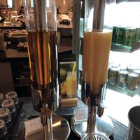 Juice station  at AUH - Pearl Lounge - TA in Abu Dhabi