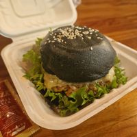 Charcoal bun vegan burger at Burger X Burger in Chiang Rai