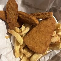 Fishless fish steak, chips and meatless chicken nuggets. Also had mushy peas!   at Family Fish Bar in Norwich