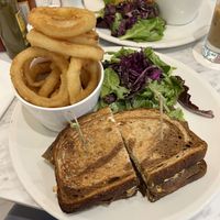 corned beef w onion rings  at Evviva - Wellesley in Toronto