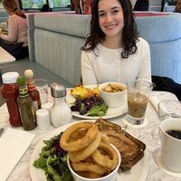 salmon benedict in the back  at Evviva - Wellesley in Toronto