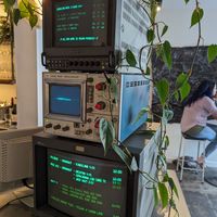 Drinks menu on old school monitors at Luntian in Auckland