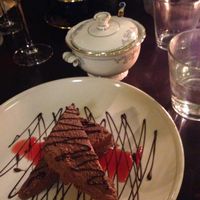 chocolate mousse with blood orange sauce at Symbiose in The Hague