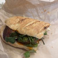 Half eaten bahn mi  at Bánh mì Bà Ba Kawagoe - バインミーバーバー川越店 in Kawagoe