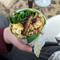 Curry tofu scramble on spinach wrap with tofu bacon at The Green Bean in New Bedford