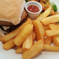 The ultimate lentil burger with Portobello mushroom and vegan brie  at Sinners Cafe in Berwick Upon Tweed
