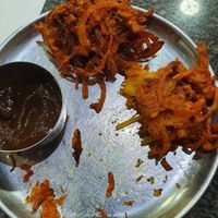 Onion bhajees, served with nice-tasting chutney at Sri Rathiga - Edgware in North West London