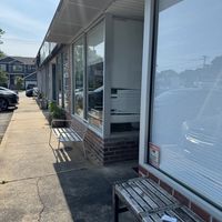 Just some benches outside. (But at least there is a place to sit. A table would be nice)  at Sedjedo Kitchen in Bellmore