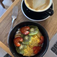 Latte and fruit bowl   at Café Caracol Púrpura in Oaxaca