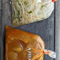 takeaway sour curry (gaeng som) and bean sprouts stir fry (pad tua gnok) at Raan Mae Anong Vegetarian - ร้านแม่อนงค์อาหารมังสวิรัติ in Bangkok