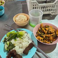 Bean sweet meat, vegetables with white rice, mushrooms laab, bao bun with vegan sweet meat inside at Raan Mae Anong Vegetarian - ร้านแม่อนงค์อาหารมังสวิรัติ in Bangkok