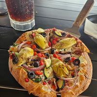 Super tasty pizza w/ vegan cheese at Black Rock Pizza in Kihei