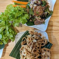 ก้อยเนื้อ goi neua (meat salad) + 
แคปเจ kaep jay (pork rinds) at Tammang Isaan Vegan - ตำมัง อีสาน เจ มังสวิรัติ วีแกน in Bangkok