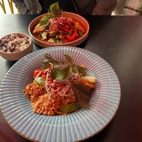 Fried rice noodles and vegan duck with black rice  at Akimy in Munich