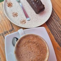 Cappuccino and vegan snickers bar at Kaffeehaus in Arequipa