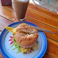 Breakfast Bagel & iced lavender latte at Free Bird Cafe Pai in Pai