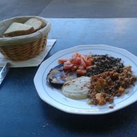 Vegan starter: red rice, hummus, lentils, tomato salad and fried eggplant

Homemade bread at L' Ecomotive in Marseille