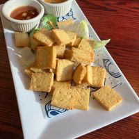Deep Fried Tofu (labeled vegan appetizer). Served with sweet cucumber sauce and peanut sauce. at Joy's Pattaya Thai Restaurant in Richfield