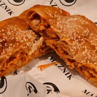 Ajvar and potato maznik cut in half. at Maznik in Spotswood