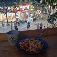 Spaghetti on the balcony overlooking the road at iVegan Supershop Old Quarter Hanoi - Healthy Plant Based Cafe in Hanoi