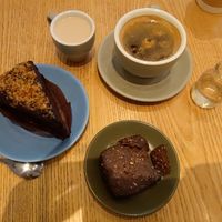 Chocolate cake, brownie, americano with oat milk. at iVegan Supershop Old Quarter Hanoi - Healthy Plant Based Cafe in Hanoi