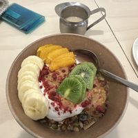 Granola vegan style with soy ilk and coconut yoghurt  at The Oatery in Wellington