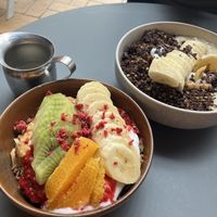 Granola bowl and banana & cacao porridge  at The Oatery in Wellington
