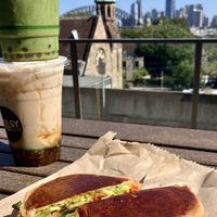 Matcha w/ cheesecake whipped cream on top, eggnog bubble tea bottom  at Ballsy Tea in North Sydney