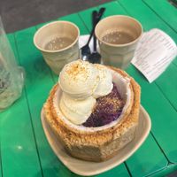 Coconut ice cream with sticky rice and free coconut water.    at Codonut in Ho Chi Minh City