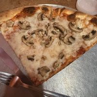 Vegan cheese pizza slices w/ mushrooms  at Moon River Pizza in Jacksonville