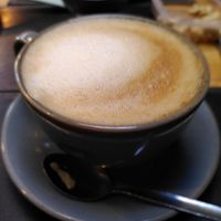 Decaf oat latte (February 2024) at Pennau Craft & Coffee Shop in Aberystwyth