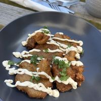 Mushrooms in batter with garlic sauce   at The Station Coffee + Kitchen in Stokesley